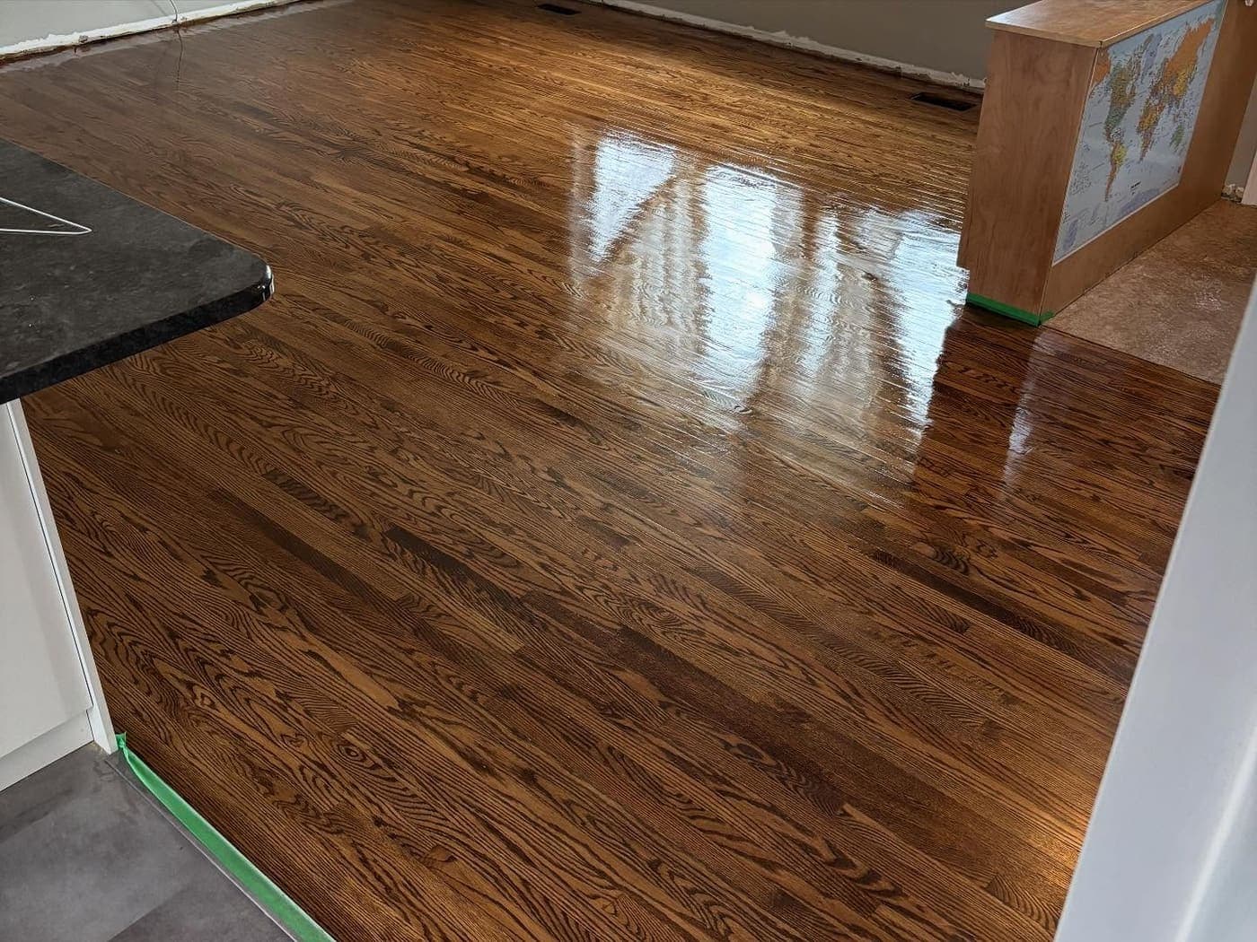 Refinished hardwood flooring with high-gloss finish